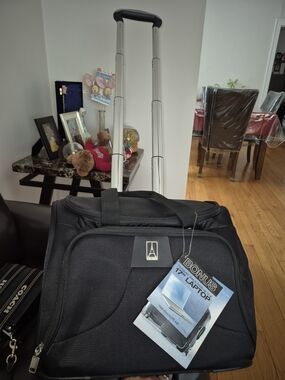 Travelpro  Black Rolling Laptop Carry-On with Telescoping Handle